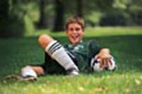 Teen boy with soccer ball
